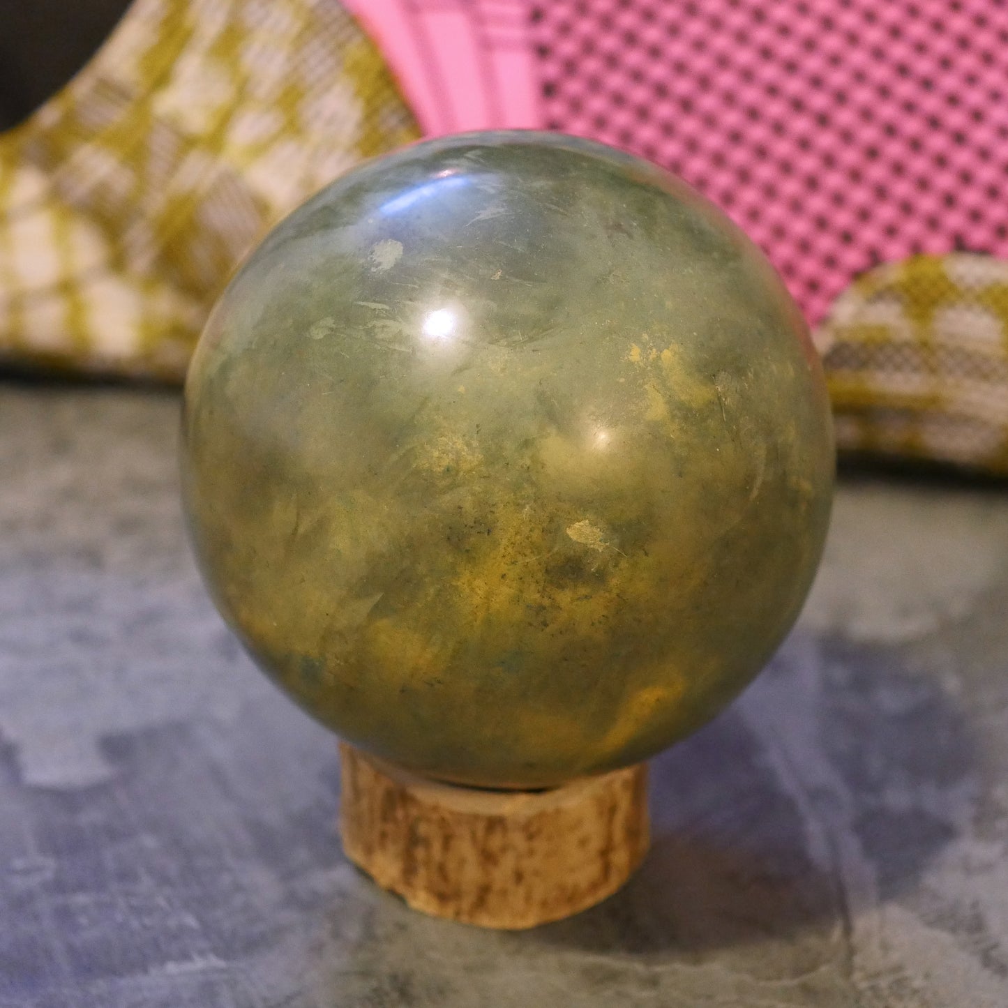 Green and yellow handcrafted Dorodango