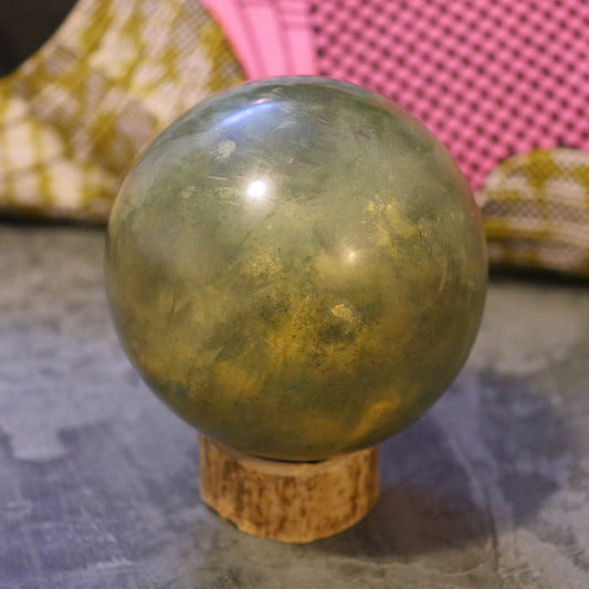 Green and yellow handcrafted Dorodango