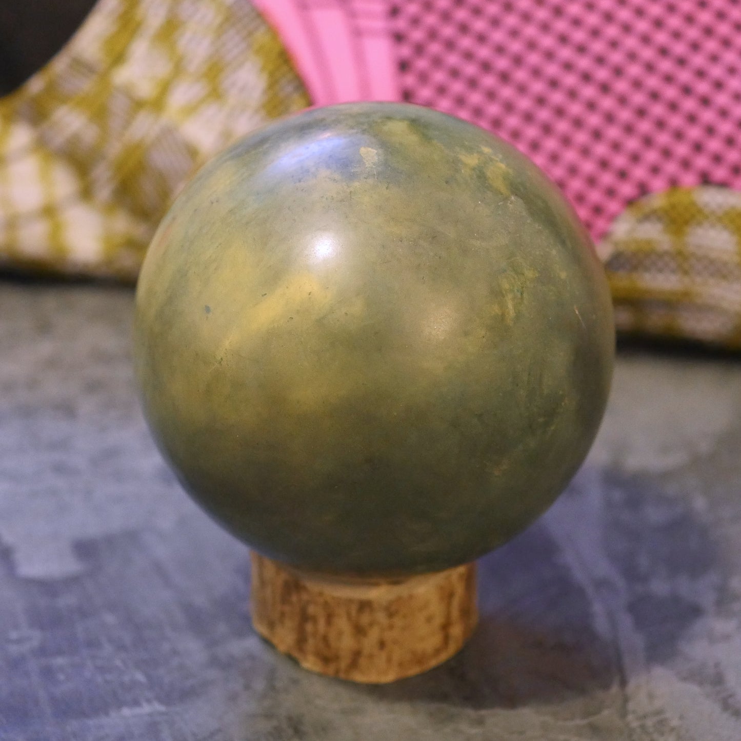 Green and yellow handcrafted Dorodango